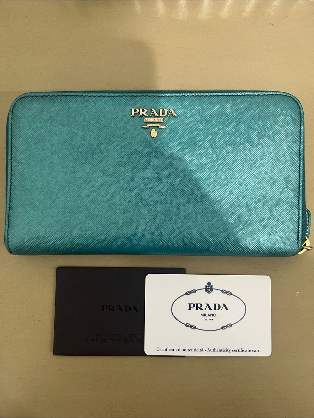 Prada Metallic Teal Saffiano Zip-Around Wallet